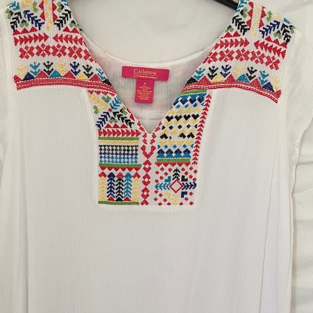 White Catherine Malandrino with colorful embroidered details on the top